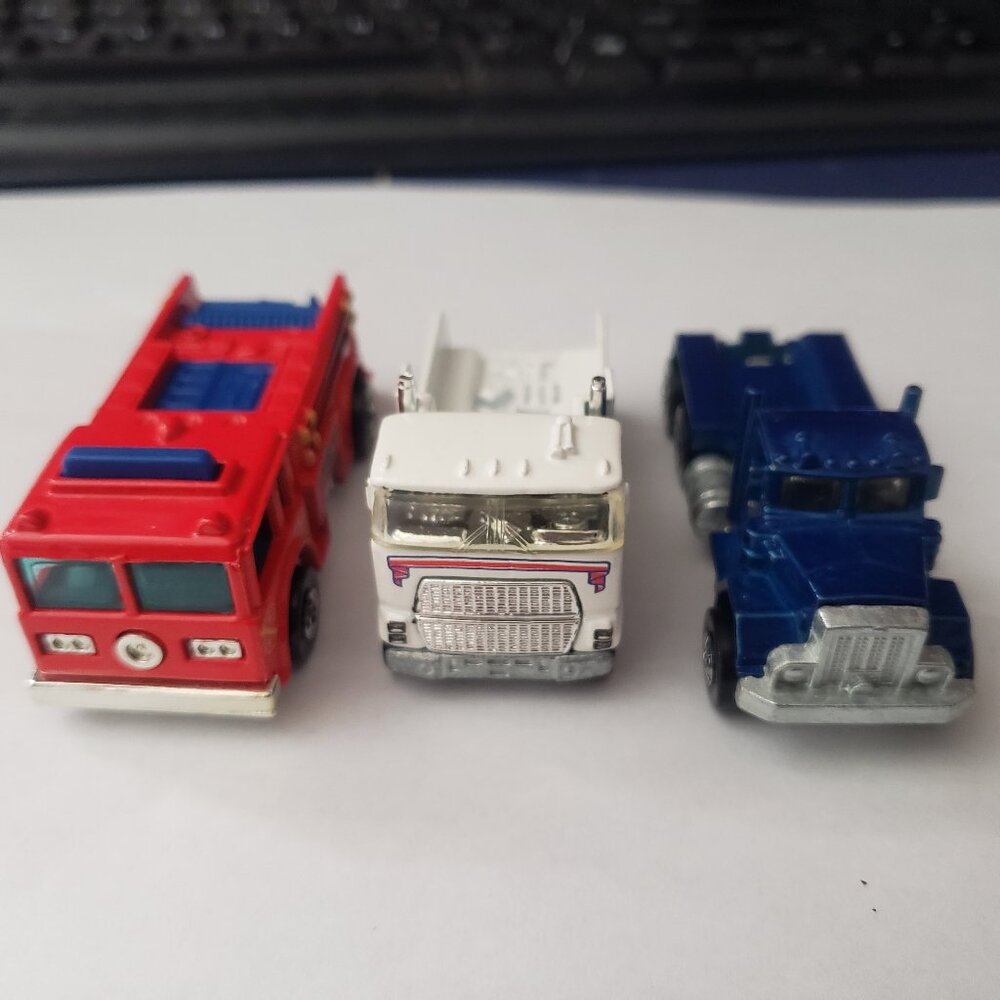 Lot of 3 Hot Wheels 1979 Peterbilt, 1981 Steve's Tow Truck 1976 Fire Eater Truck
